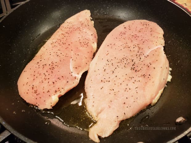 Chicken cutlets are seasoned with salt and pepper, then pan-seared in hot oil.