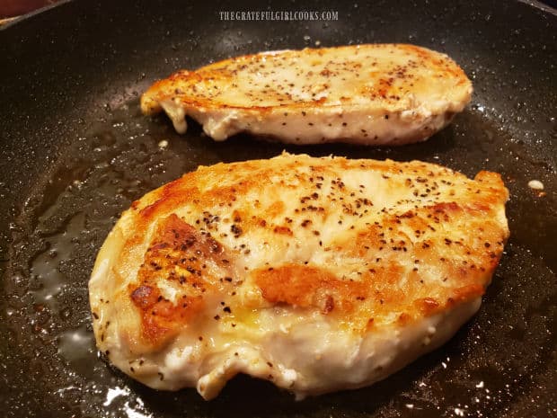 Chicken is turned over halfway through cooking, to brown both sides.