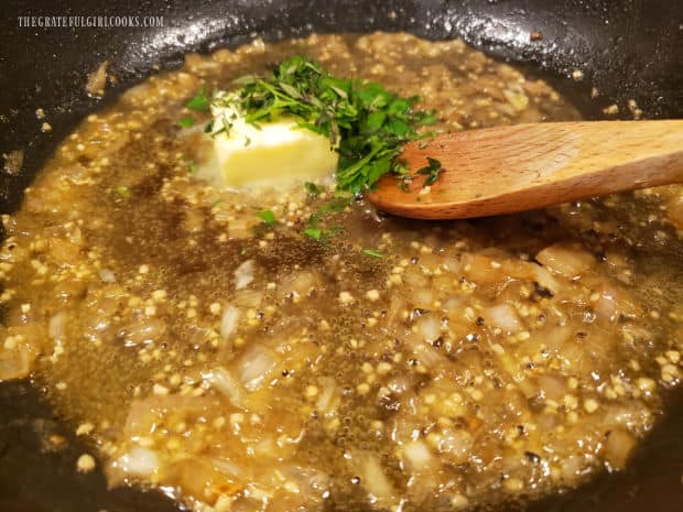 Sauce is reduced in volume, then fresh herbs and butter are added.