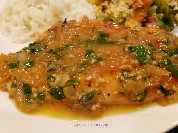 Chicken cutlets in pan sauce, served with rice and Brussel sprout casserole on the side.