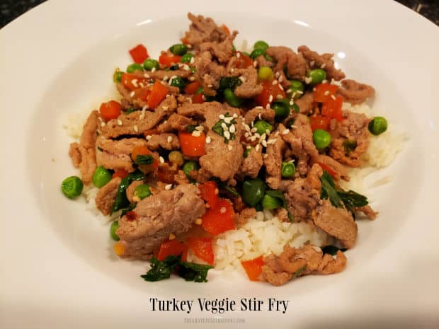 Turkey Veggie Stir Fry is an easy, low-fat meal, using ground turkey and veggies cooked in an Asian sauce, then served on top of white rice.