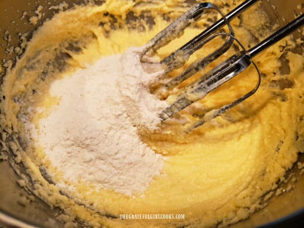 Flour, baking powder and salt are mixed into the dough until incorporated.
