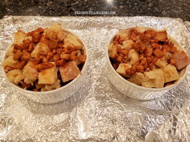 Apple Pecan French Toast cups are filled, and placed on foil-lined baking sheet.