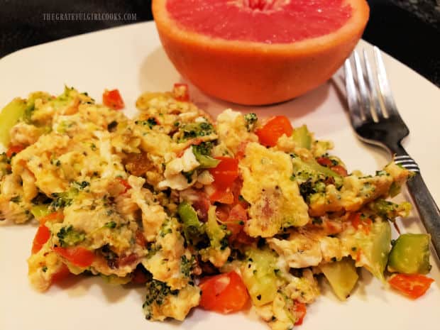 The egg, bacon and veggie scramble, served with a half red grapefruit on the side.