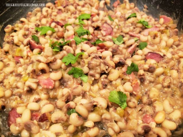 The Southwest-style blackeyed peas are garnished with cilantro before serving.