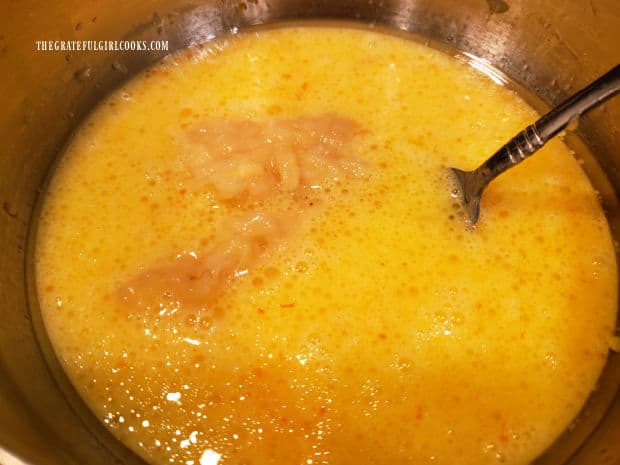 Mashed banana is added and combined with the egg mixture.