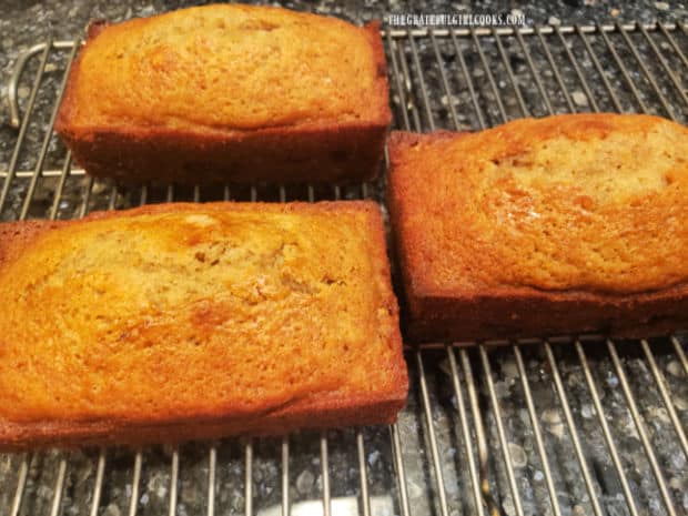 All 3 loaves of chocolate chip orange bread removed from pans, and cooling on a wire rack.