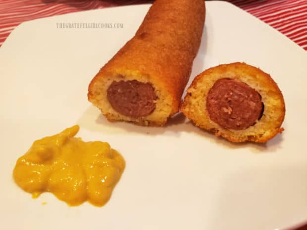 One of the homemade corn dogs, cut open to reveal the inside.