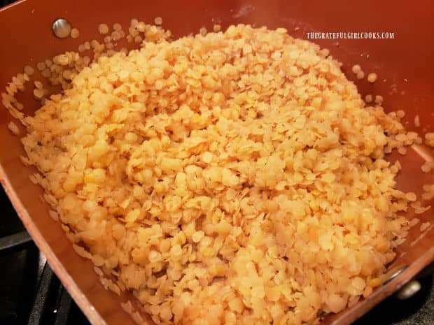 After draining off water, the cooked lentils are ready to add to the soup.