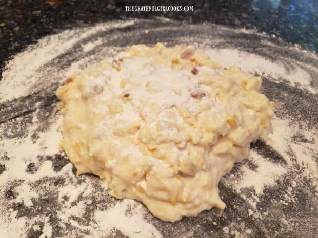 Dusted with flour, the scone dough is ready to be kneaded, then shaped.