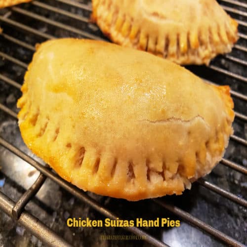 Chicken Suizas Hand Pies are delicious, baked, hand-held pastries filled with chicken, cream cheese, green chiles, jack and cheddar cheeses.