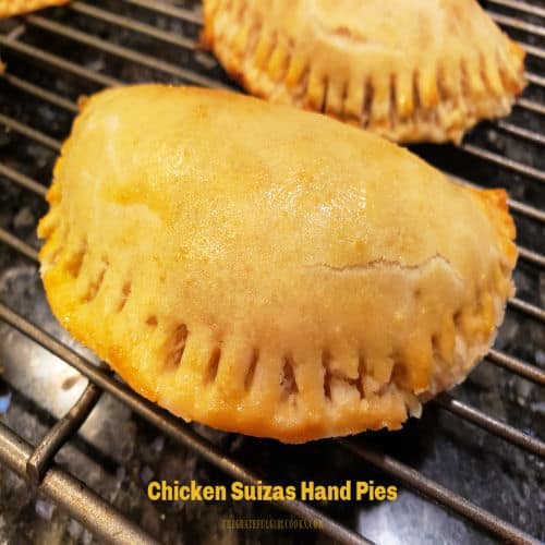 Chicken Suizas Hand Pies are delicious, baked, hand-held pastries filled with chicken, cream cheese, green chiles, jack and cheddar cheeses.