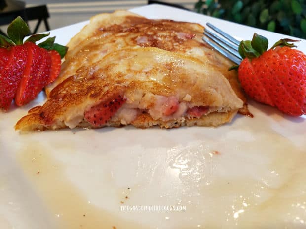 You can see the strawberries inside one of the strawberry oatmeal pancakes.