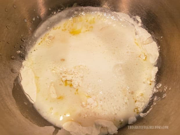 A wet, thin batter is combined to help coat the fish fillets.