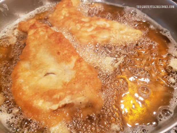 Both sides of the rockfish cook until golden brown and crispy.