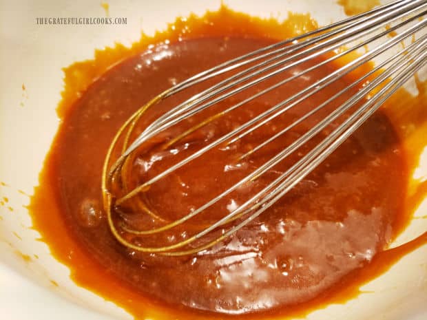 A wire whisk is used to combine the wet ingredients for the batter.