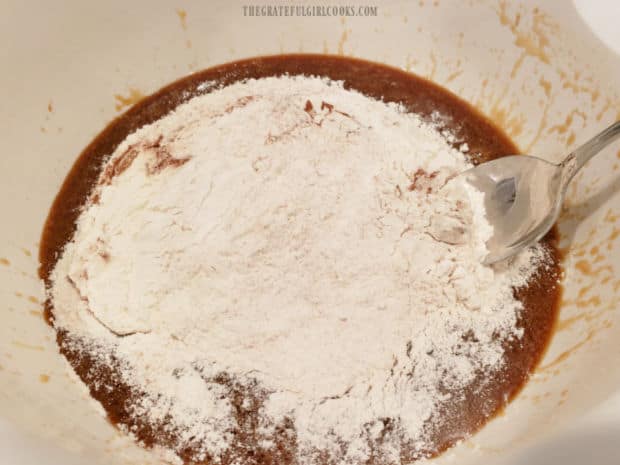 Flour mixture is stirred into the wet batter mixture until combined.