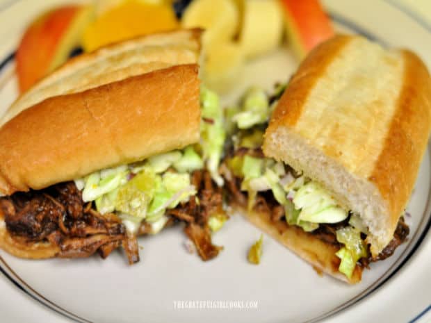 BBQ shredded pork sandwiches, with spicy coleslaw on top of the meat.