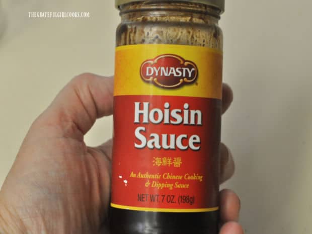 A jar of commercially prepared hoisin sauce, used in this recipe.
