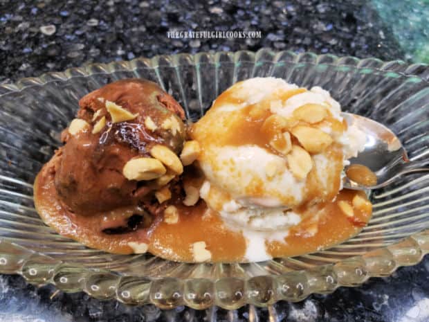 Peanut butter ice cream sauce, served over chocolate and vanilla ice cream scoops in dish.