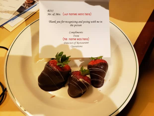 Note on a plate of chocolate covered strawberries sent to our room on a cruise.