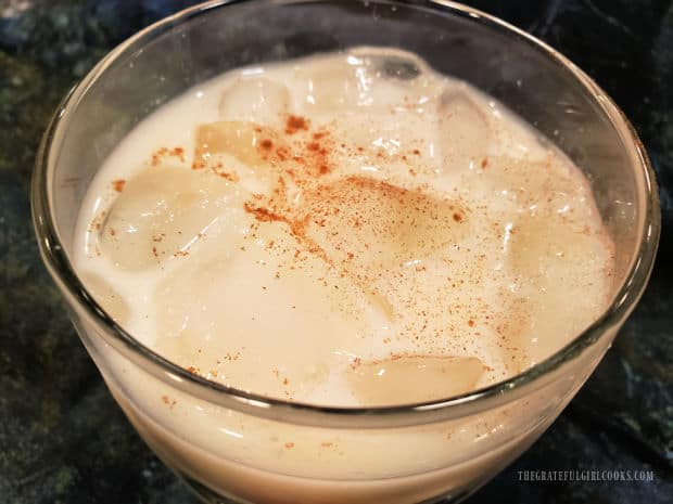 Ground cinnamon is sprinkled on each cup of iced, classic Mexican horchata.
