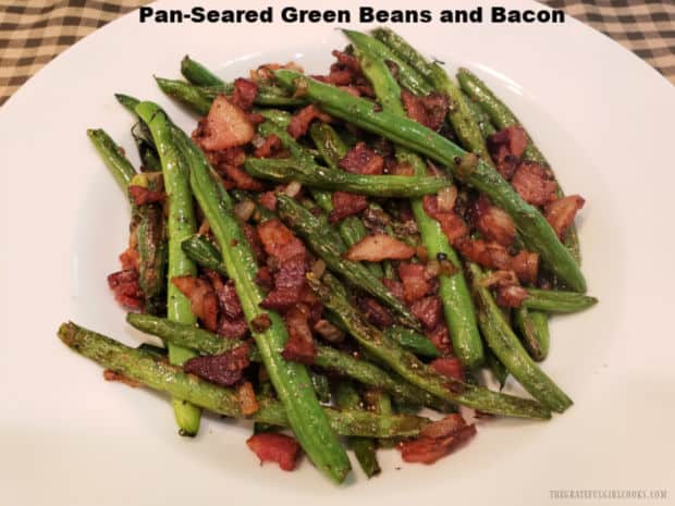 Pan-Seared Green Beans and Bacon is a simple, fresh veggie side dish you'll enjoy! Green beans are seasoned with garlic, onion, and BACON!