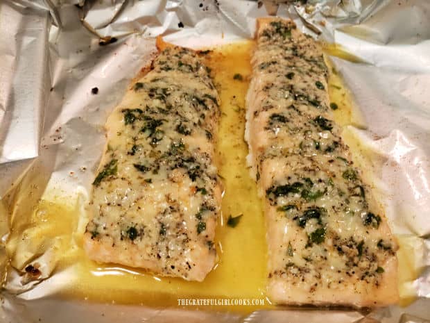 Two pieces of parmesan herb baked salmon, after baking.