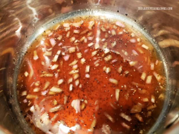 Leftover marinade is placed in a small pan to boil.