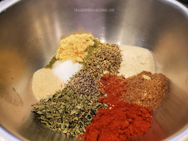 Spices for the ribs are combined in a small metal bowl.