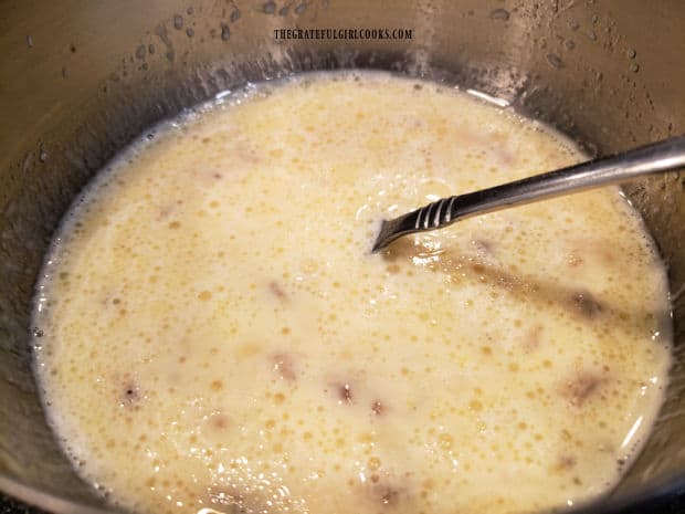 The wet ingredients are fully combined for the pancake batter.