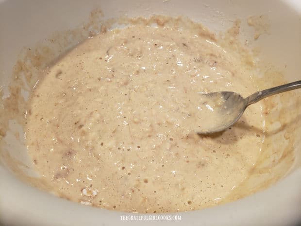 After mixing, the batter for banana oat pancakes is ready for cooking.