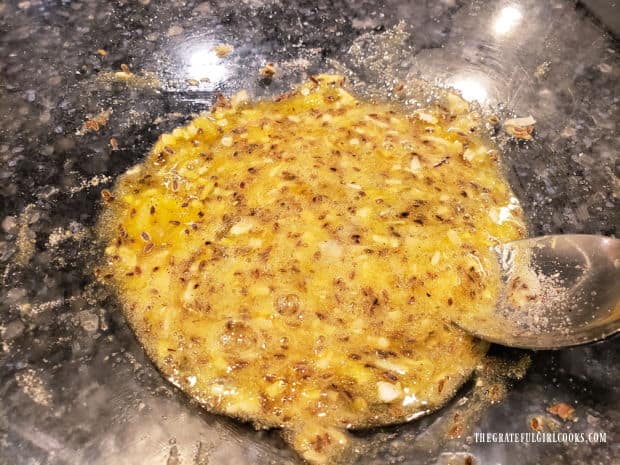 After mixing, wet ingredients for dilly bread are ready for more ingredients.