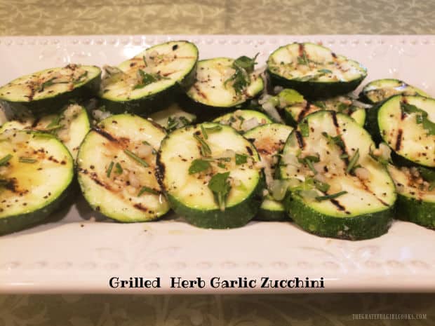 Make Grilled Herb Garlic Zucchini on indoor or outdoor grills! Topped with a garlic herb dressing, this is a fresh way to enjoy this veggie. 