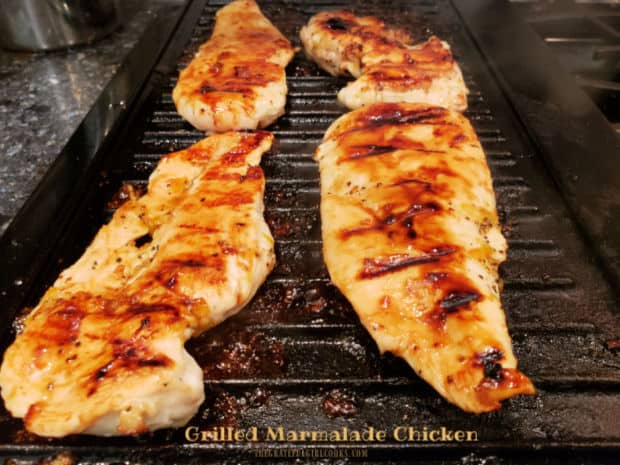 Grilled Marmalade Chicken is an easy to make dish, featuring chicken breasts basted with a flavorful orange marmalade, lime, and ginger sauce.