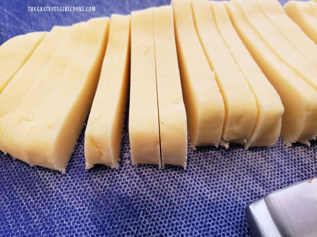 Each chilled dough log is cut into thin slices.