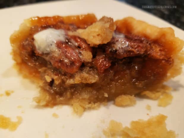 The inside of the miniature pecan pies is thick, sweet, and decadent.