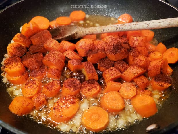 Carrots, maple syrup, water, salt, chile powder and cinnamon are stirred in.