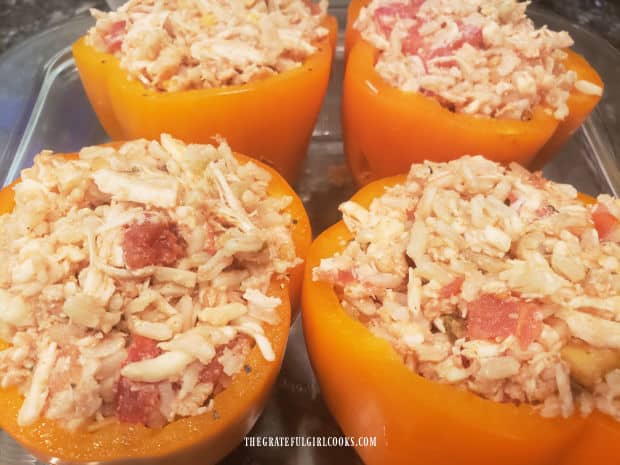Jack O' Lantern peppers are stuffed with the chicken and rice filling.