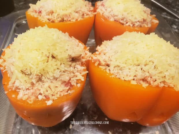 Stuffed Jack O' Lantern peppers are covered with breadcrumbs and Parmesan.