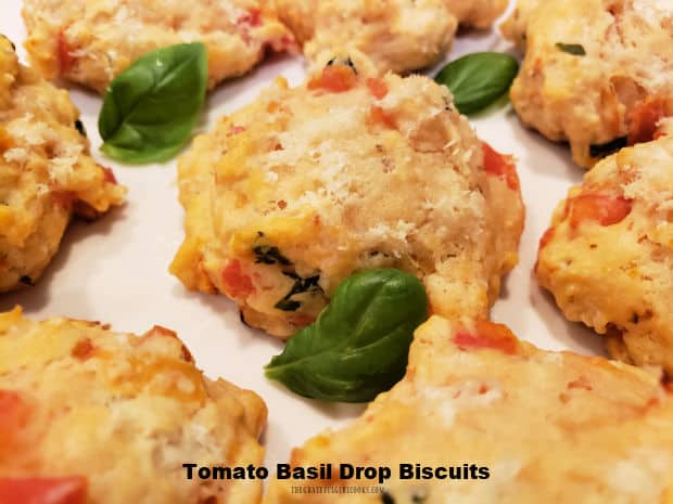 Tomato Basil Drop Biscuits are an easy side dish you'll enjoy! Biscuits are flavored with Parmesan cheese, tomatoes, onions and basil.