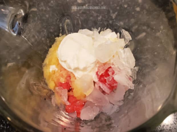 Ingredients for the watermelon pineapple smoothie in a blender.