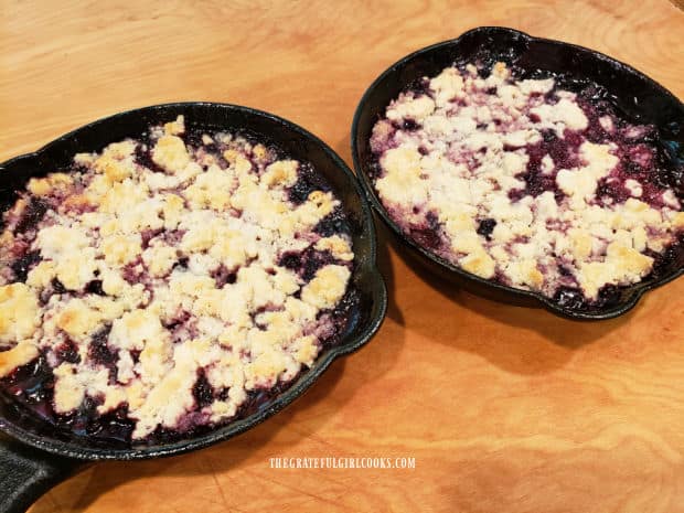 The cobbler crumb topping is light golden brown after they finish cooking.