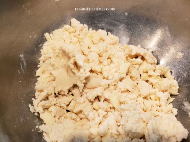 The cobbler topping is a soft, crumbly dough in a big bowl.