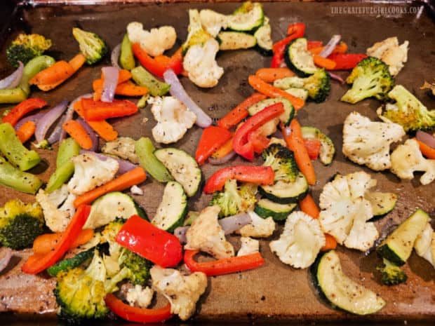 Seasoned vegetables are roasted in single layer on a baking pan.