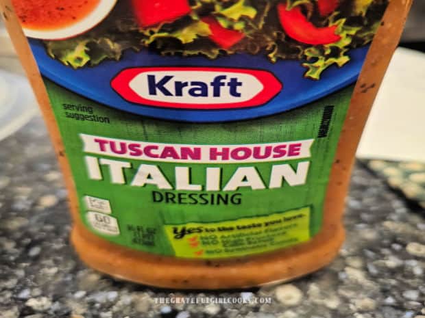 Italian salad dressing is used to flavor the orzo salad.