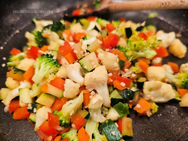 The chopped vegetables cool to room temp. after cooking.