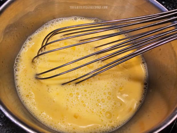 Eggs, milk, vanilla and sugar are whisked together to make egg batter.