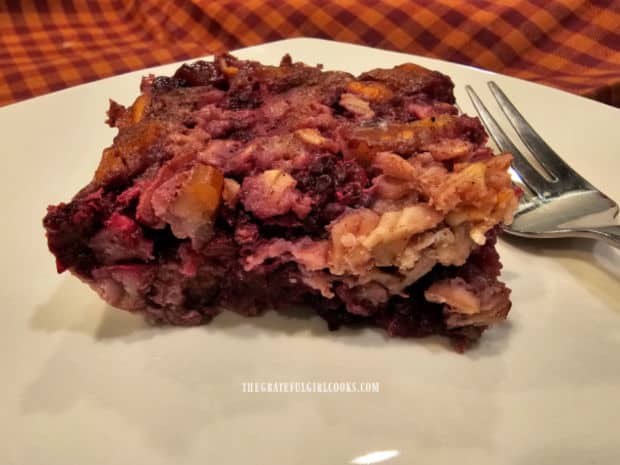 A serving of the blackberry pecan baked oatmeal on a white plate.