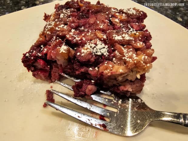 Sprinkled with powdered sugar, the blackberry pecan baked oatmeal is served.